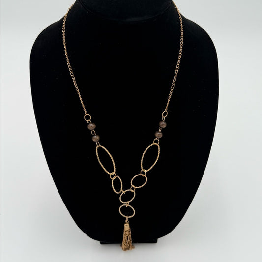 Elegant Gold Necklace with Tassel