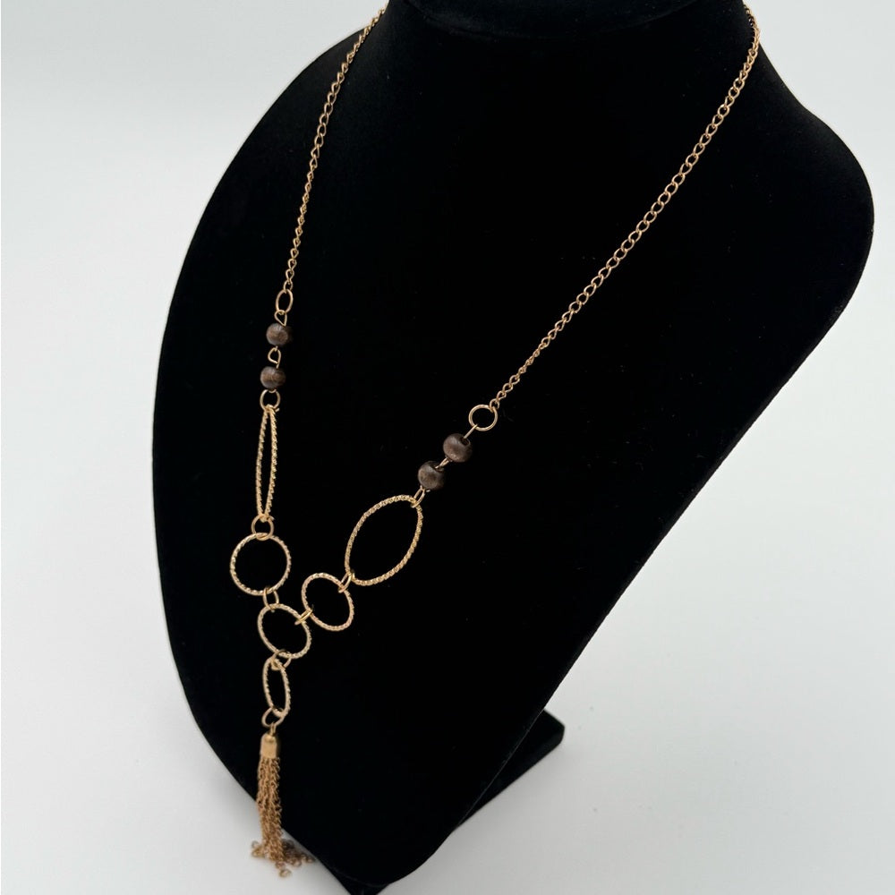 Elegant Gold Necklace with Tassel