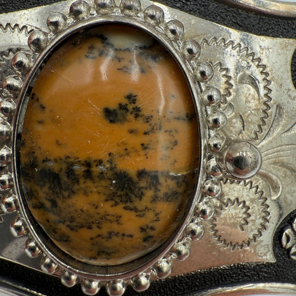 Silver and Black Belt Buckle with Stone Accent