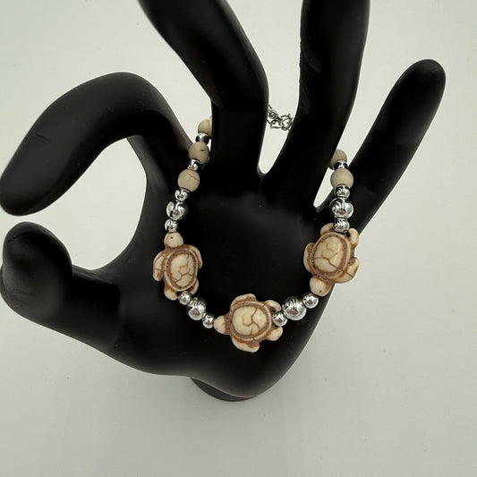 Carved Turtle Bead Bracelet With Silver Beads and Extender Chain